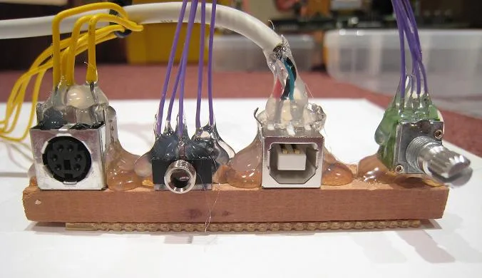 Rear port connectors, hot-glued in place
