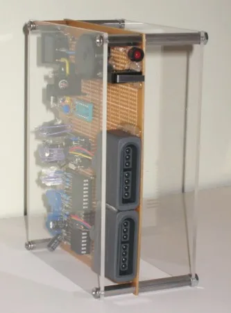 Uzebox in a clear acrylic case, front