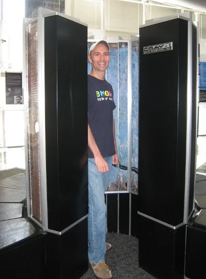 Steve standing inside a Cray-1 supercomputer