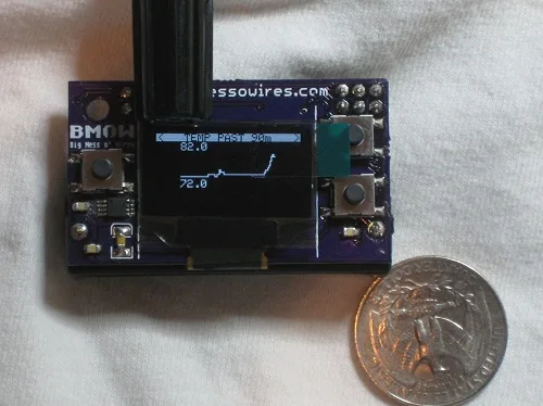Logger Mini next to a quarter
