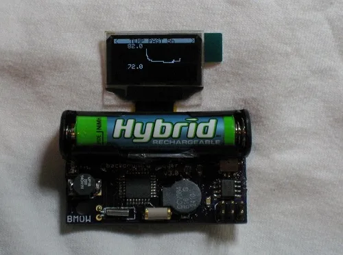 Logger Mini unfolded, showing its battery