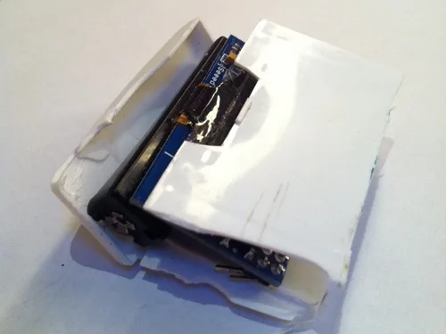 Smashed plastic case of the Logger Mini