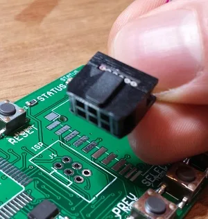Header pressed into the board's programming holes
