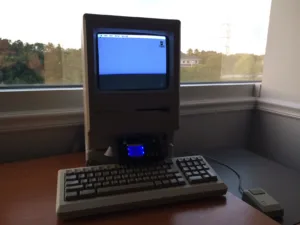 LEGO Floppy Emu case next to a Mac