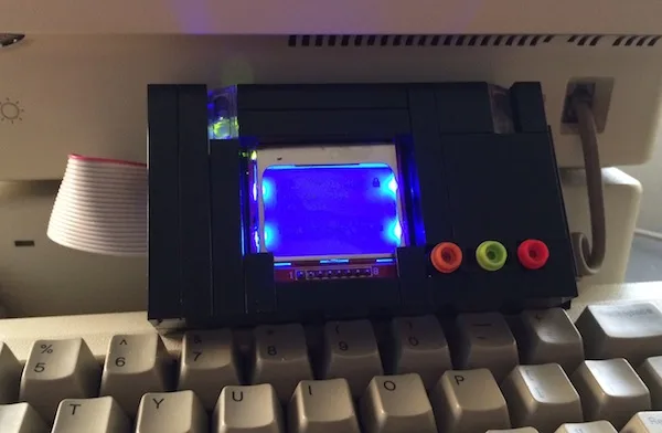LEGO Floppy Emu case on a Mac keyboard