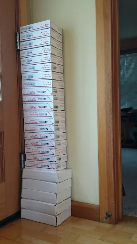Tall stack of shipping boxes