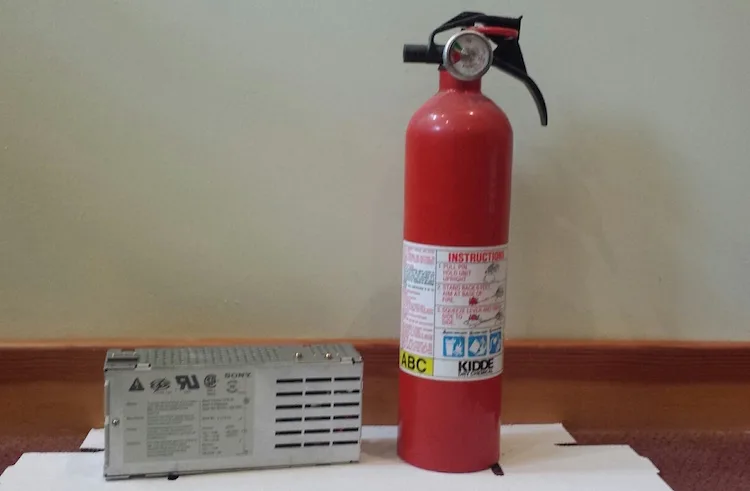 Power supply next to a fire extinguisher