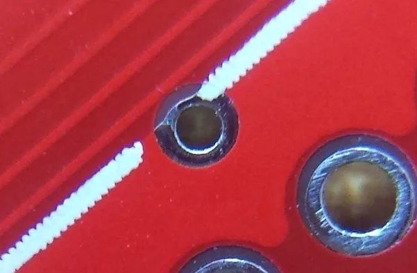 Close-up of a via and soldermask gap