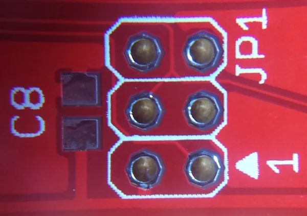 Close-up of PCB pads and silkscreen