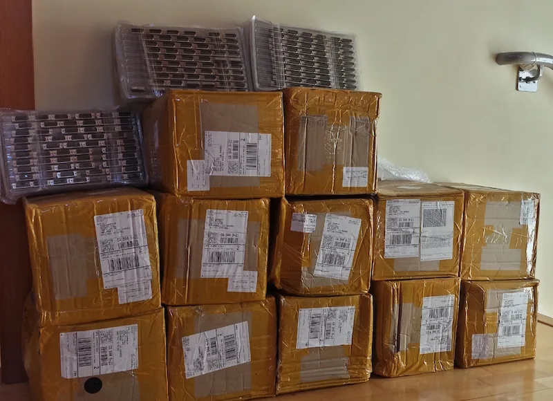 Stacked boxes of DB-19 connectors