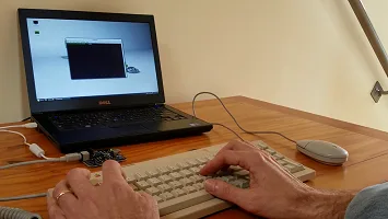 ADB keyboard and mouse used with a modern laptop