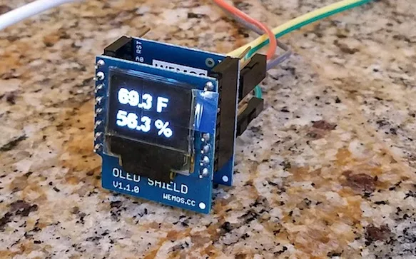 ESP8266 with an OLED showing temperature and humidity