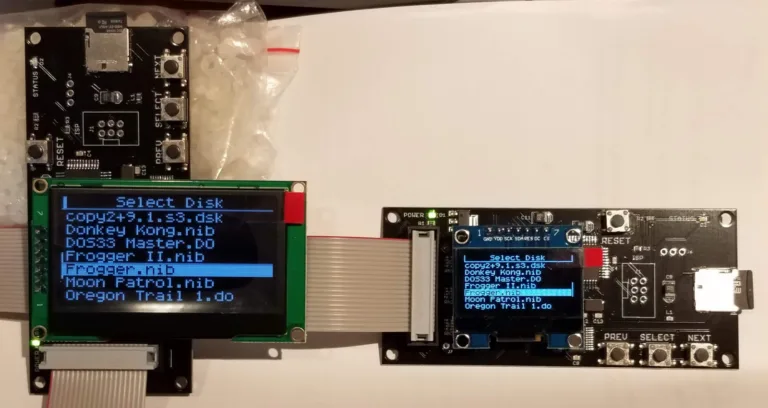 Jumbo OLED next to a Floppy Emu