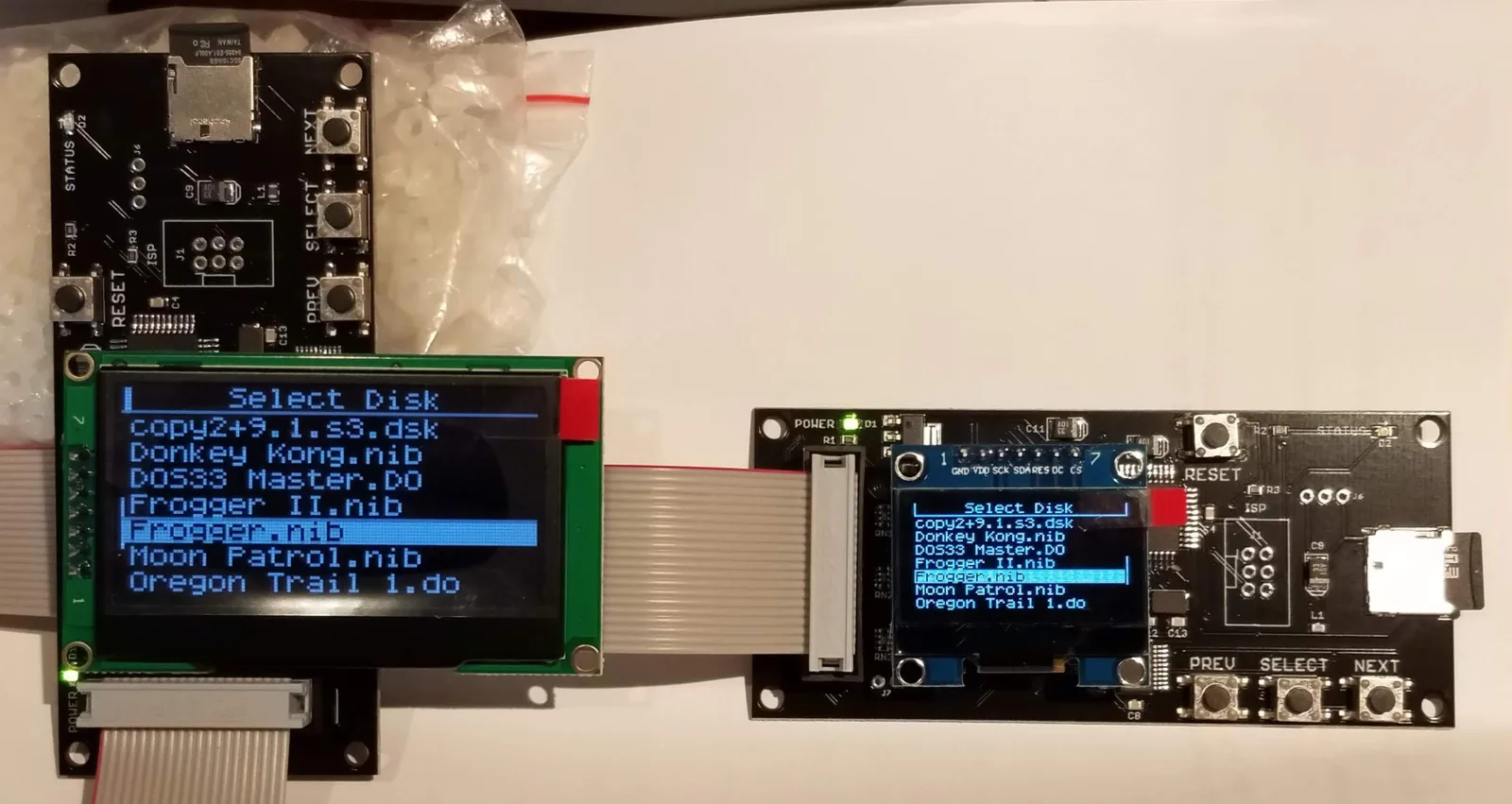 Jumbo OLED next to a Floppy Emu