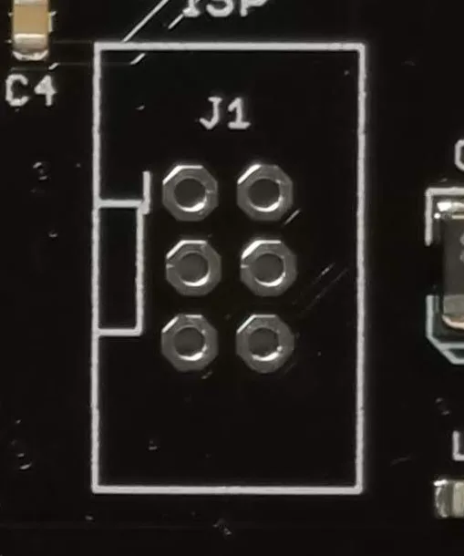 Floppy Emu J1 programming header holes