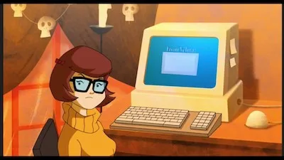 Cartoon character at an old computer