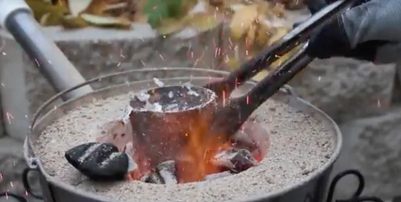 Melting metal in a backyard foundry