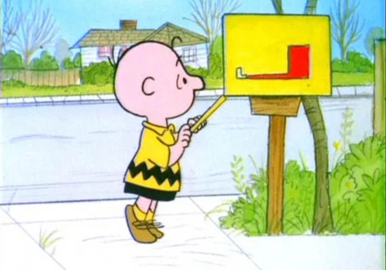 Charlie Brown at an empty mailbox