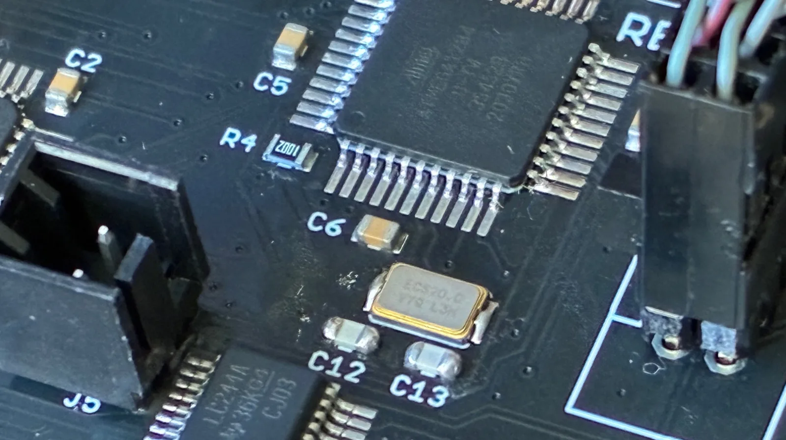 Circuit board with crystal and capacitors
